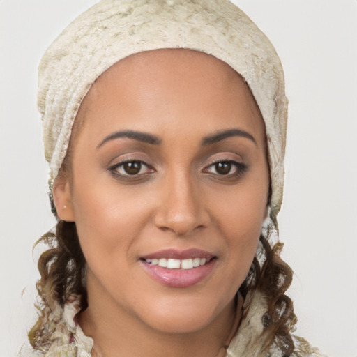 Joyful white young-adult female with medium  brown hair and brown eyes