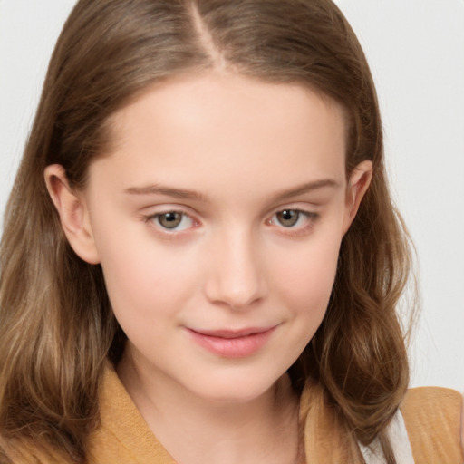 Joyful white child female with long  brown hair and brown eyes