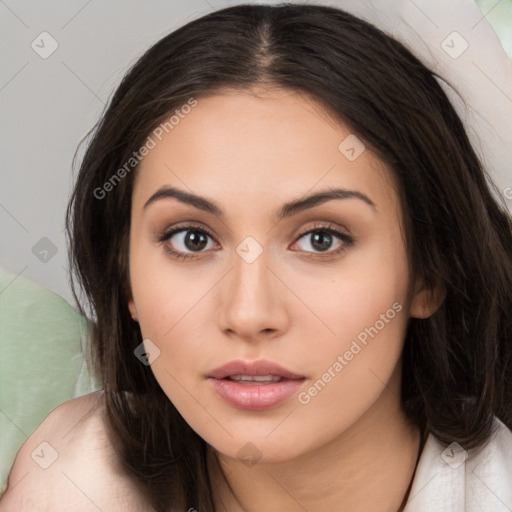 Neutral white young-adult female with long  brown hair and brown eyes