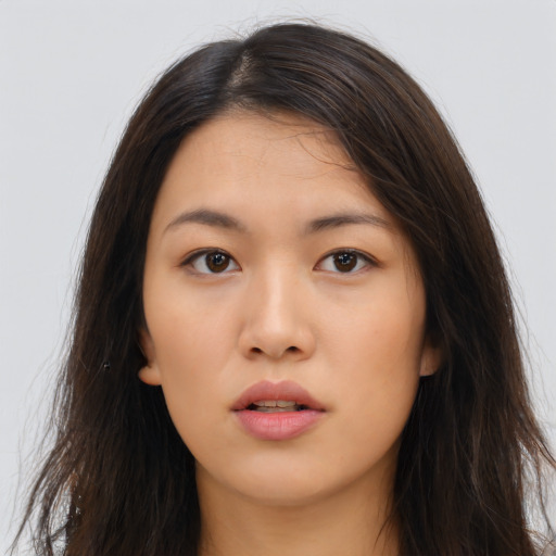 Neutral asian young-adult female with long  brown hair and brown eyes