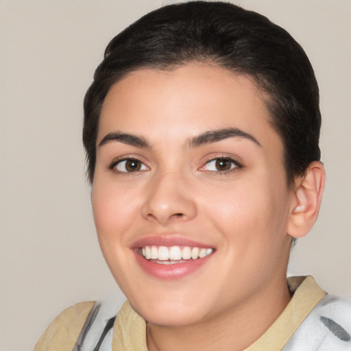 Joyful white young-adult female with short  brown hair and brown eyes