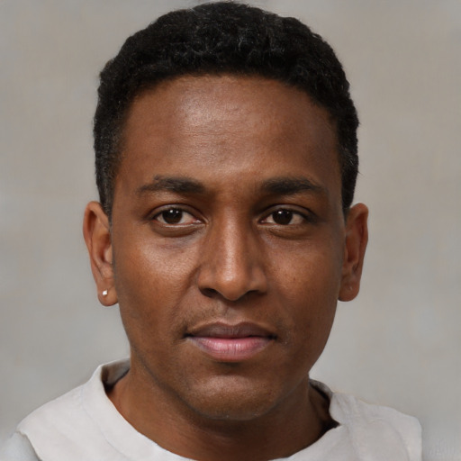 Neutral black young-adult male with short  black hair and brown eyes