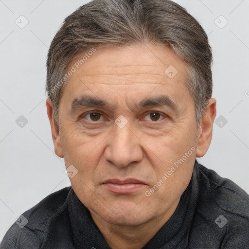 Joyful white middle-aged male with short  brown hair and brown eyes