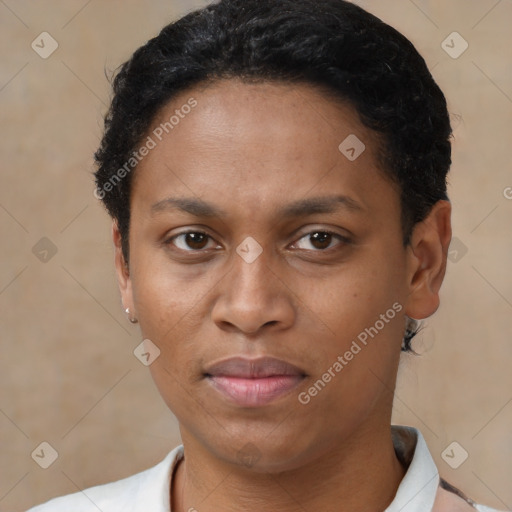 Joyful black young-adult female with short  brown hair and brown eyes