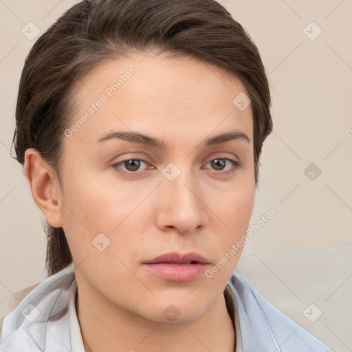 Neutral white young-adult female with short  brown hair and brown eyes