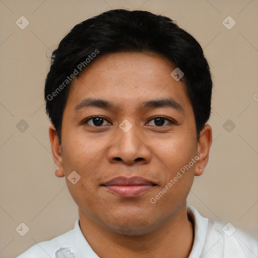 Joyful asian young-adult male with short  black hair and brown eyes