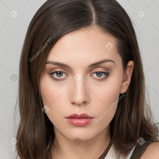 Neutral white young-adult female with long  brown hair and brown eyes