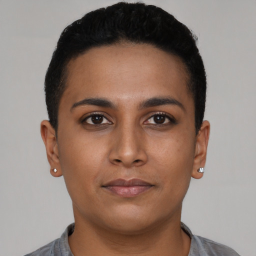 Neutral latino young-adult female with short  black hair and brown eyes