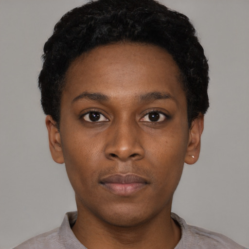 Neutral black young-adult female with short  black hair and brown eyes