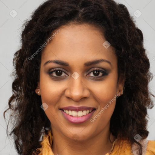 Joyful black young-adult female with long  brown hair and brown eyes