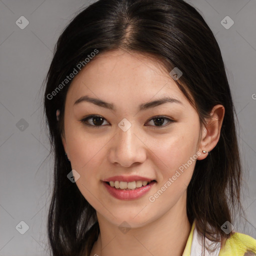 Joyful latino young-adult female with medium  brown hair and brown eyes