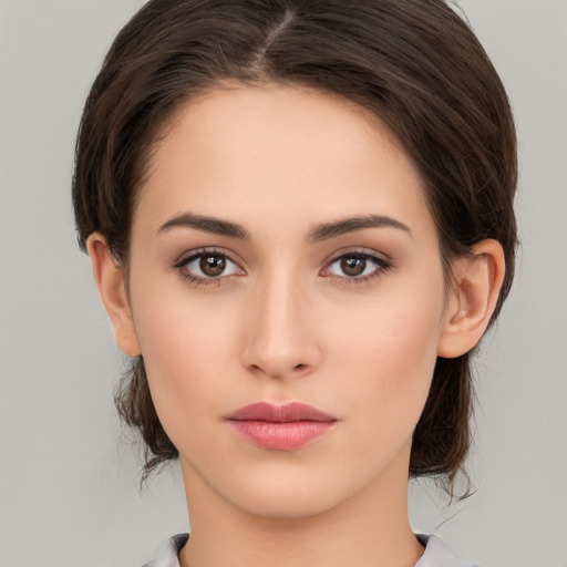 Neutral white young-adult female with medium  brown hair and brown eyes