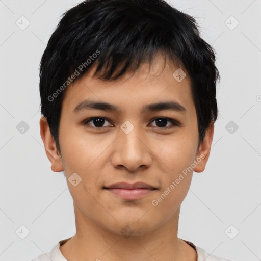 Joyful asian young-adult male with short  black hair and brown eyes