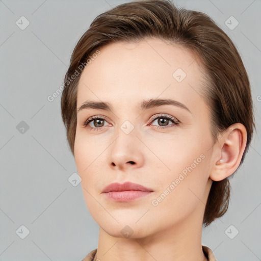 Neutral white young-adult female with medium  brown hair and grey eyes