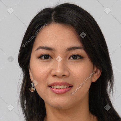 Joyful asian young-adult female with long  brown hair and brown eyes