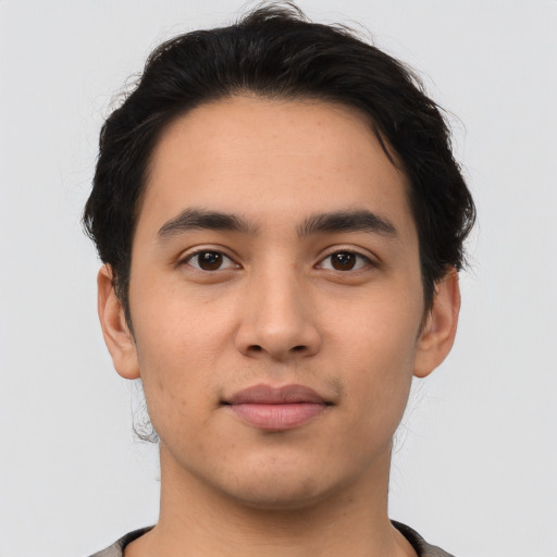 Neutral latino young-adult male with short  brown hair and brown eyes