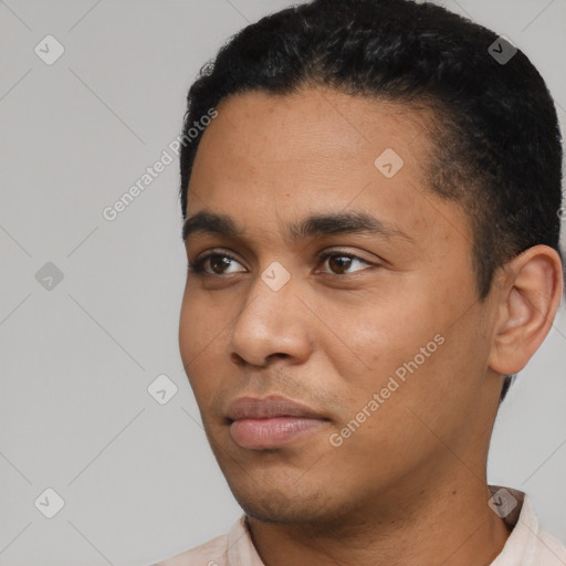 Neutral latino young-adult male with short  black hair and brown eyes