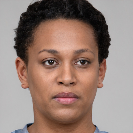 Neutral black young-adult female with short  brown hair and brown eyes
