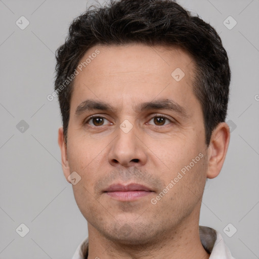 Neutral white adult male with short  black hair and brown eyes