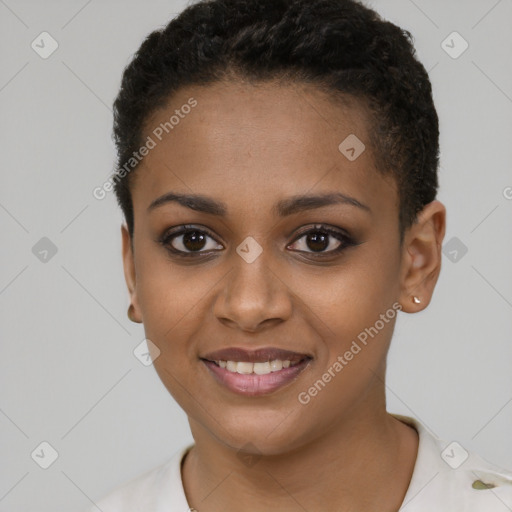 Joyful black young-adult female with short  brown hair and brown eyes