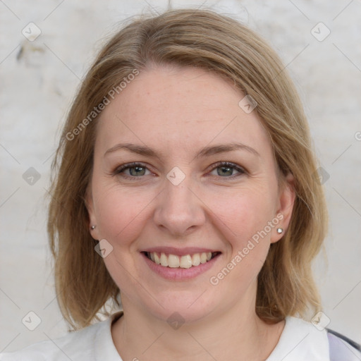 Joyful white young-adult female with medium  brown hair and blue eyes