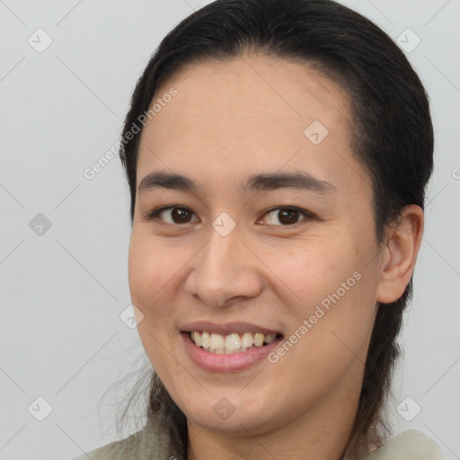 Joyful white young-adult female with medium  brown hair and brown eyes