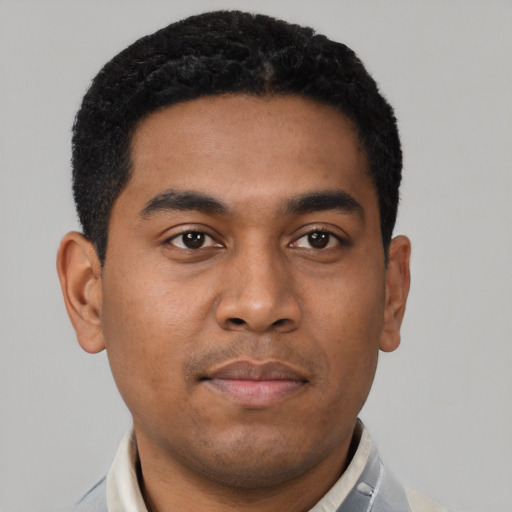 Neutral latino young-adult male with short  black hair and brown eyes