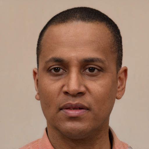 Neutral latino adult male with short  black hair and brown eyes