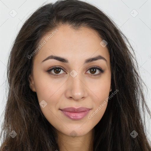 Joyful latino young-adult female with long  brown hair and brown eyes