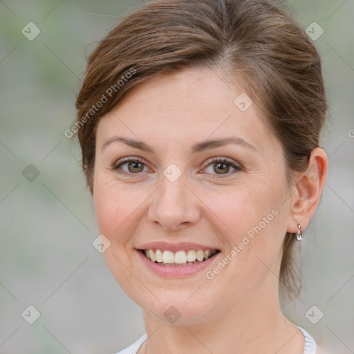 Joyful white young-adult female with medium  brown hair and green eyes