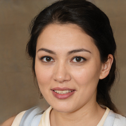 Joyful white young-adult female with medium  brown hair and brown eyes