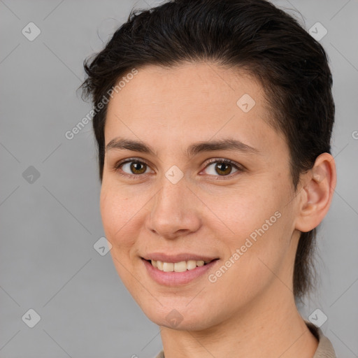 Joyful white young-adult female with short  brown hair and brown eyes