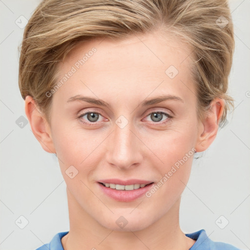 Joyful white young-adult female with short  brown hair and grey eyes