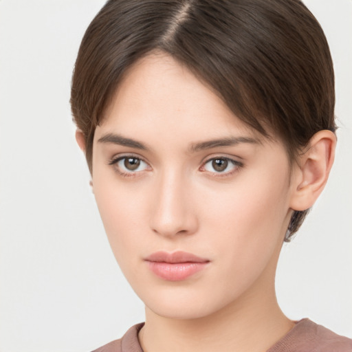 Neutral white young-adult female with short  brown hair and brown eyes