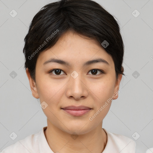 Joyful asian young-adult female with short  brown hair and brown eyes