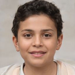 Joyful white child male with short  brown hair and brown eyes