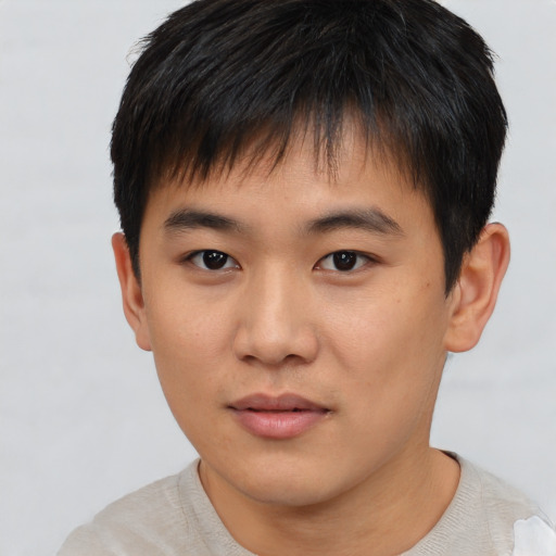Neutral asian young-adult male with short  brown hair and brown eyes