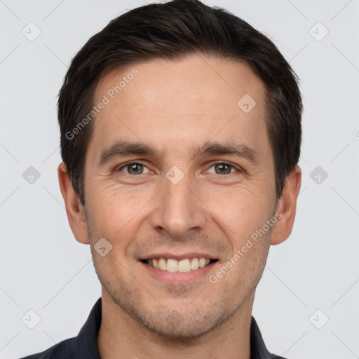 Joyful white young-adult male with short  brown hair and brown eyes