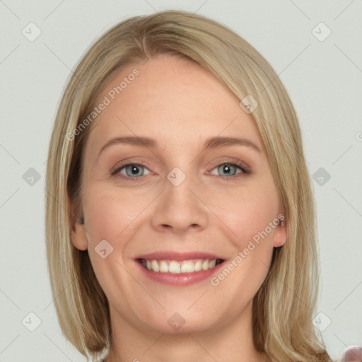 Joyful white young-adult female with long  brown hair and blue eyes