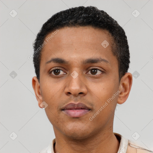 Neutral latino young-adult male with short  black hair and brown eyes