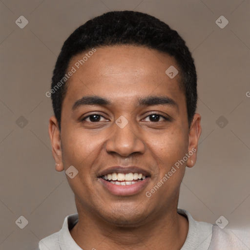 Joyful black young-adult male with short  black hair and brown eyes