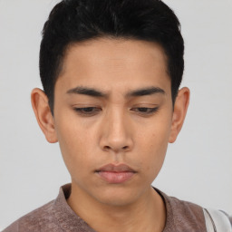 Neutral asian young-adult male with short  black hair and brown eyes