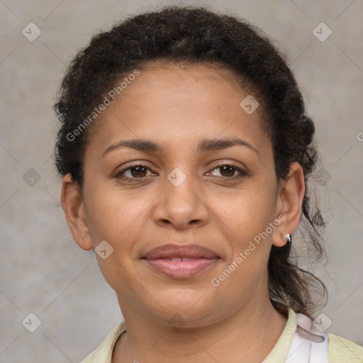 Joyful latino young-adult female with short  brown hair and brown eyes