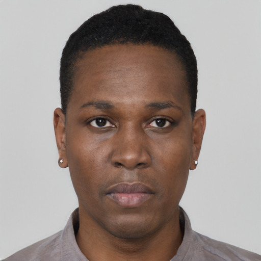 Neutral black young-adult male with short  black hair and brown eyes