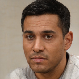 Neutral white adult male with short  black hair and brown eyes