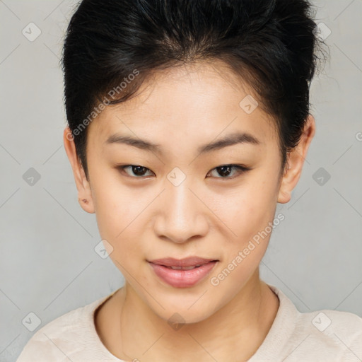 Joyful asian young-adult female with short  brown hair and brown eyes