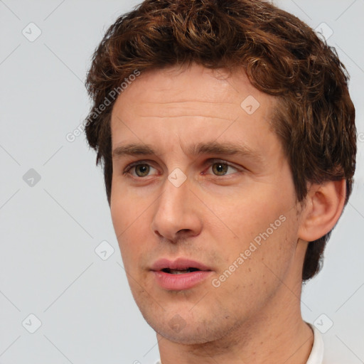 Neutral white adult male with short  brown hair and brown eyes