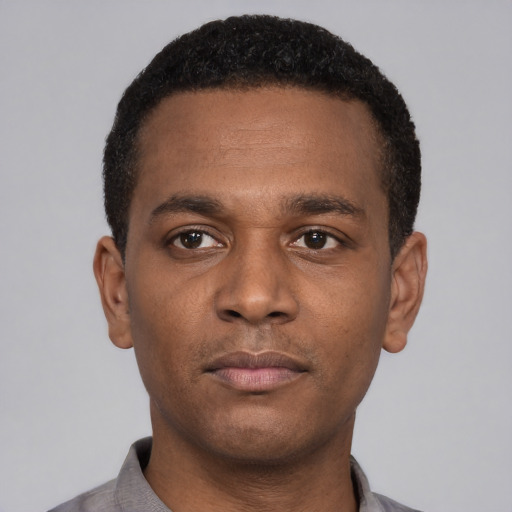 Neutral black young-adult male with short  black hair and brown eyes