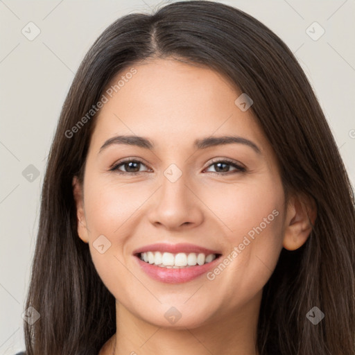 Joyful white young-adult female with long  brown hair and brown eyes