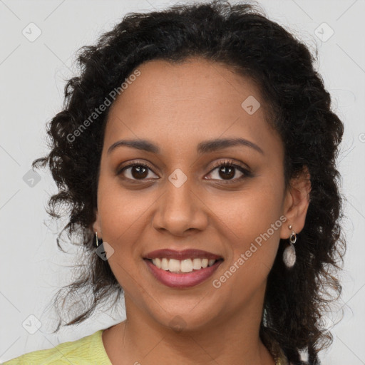 Joyful latino young-adult female with long  brown hair and brown eyes